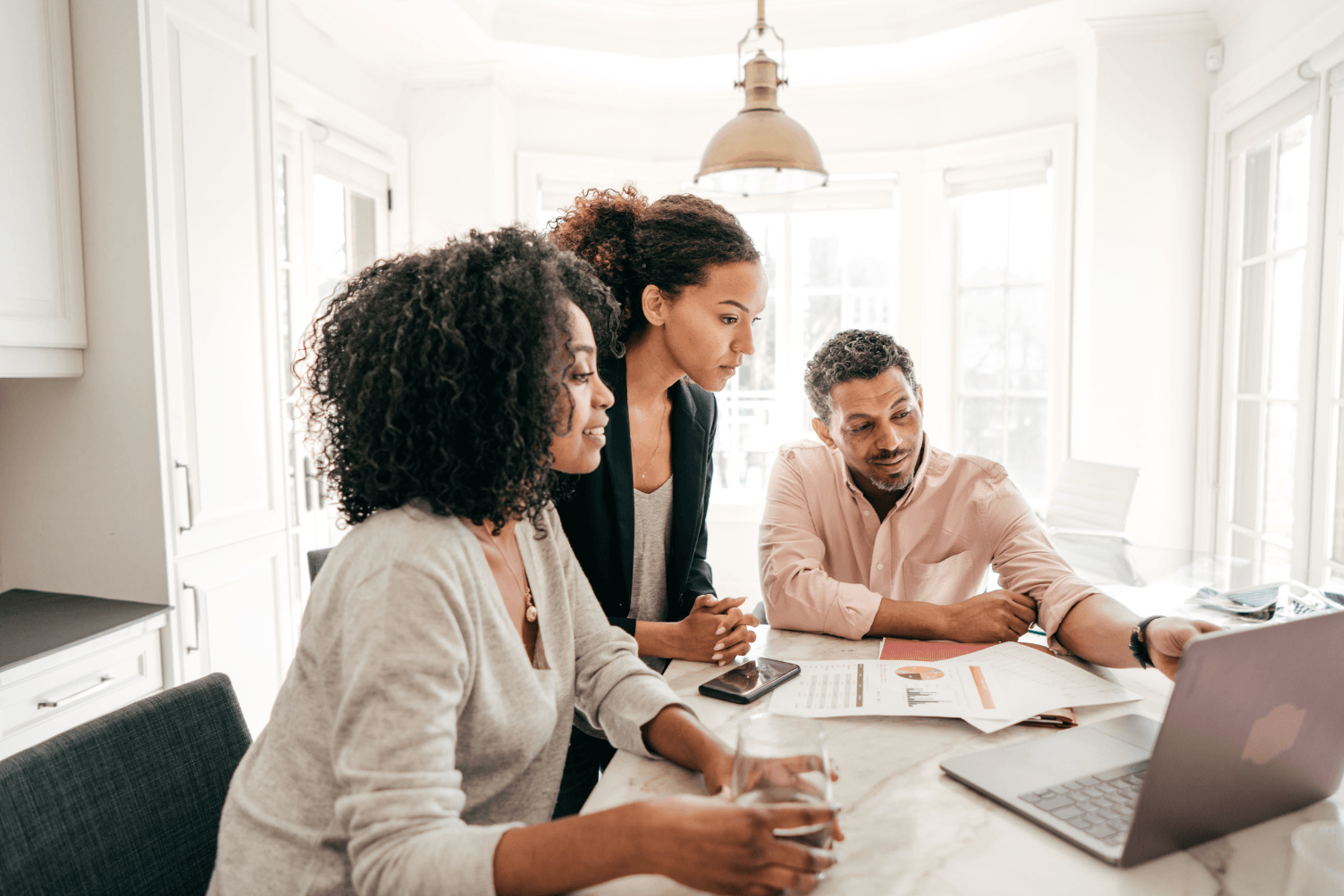 business funding strategy session analyzing financial reports and approval readiness